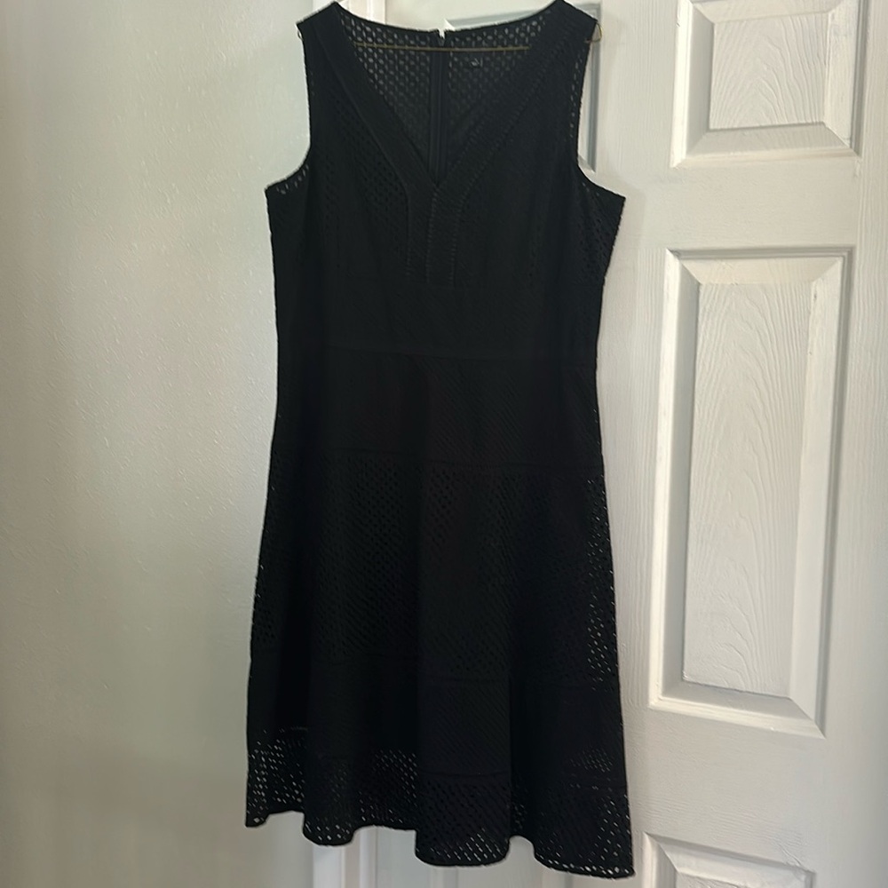 MIDI length black dress.